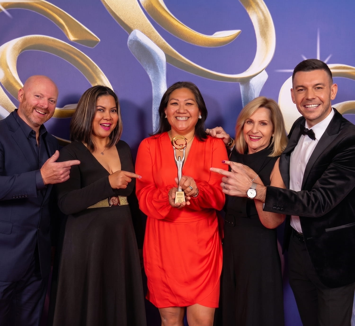 Emma Allen and the Active Property Investing team with an industry award